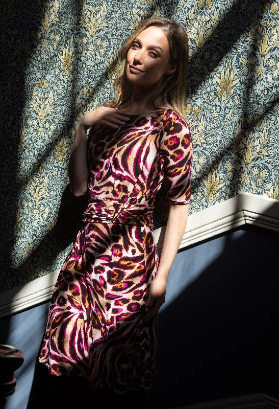 Velvet midi dresses in jewel tones for a glamorous winter event Leo Print Dress