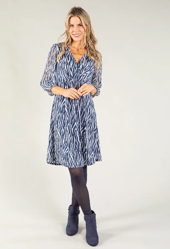 Midi dresses with ruched bodices for a feminine and fitted feel Wrap Bodice Zebra Print Dress Midi dresses with ruched bodices for a feminine and fitted feel Wrap Bodice Zebra Print Dress