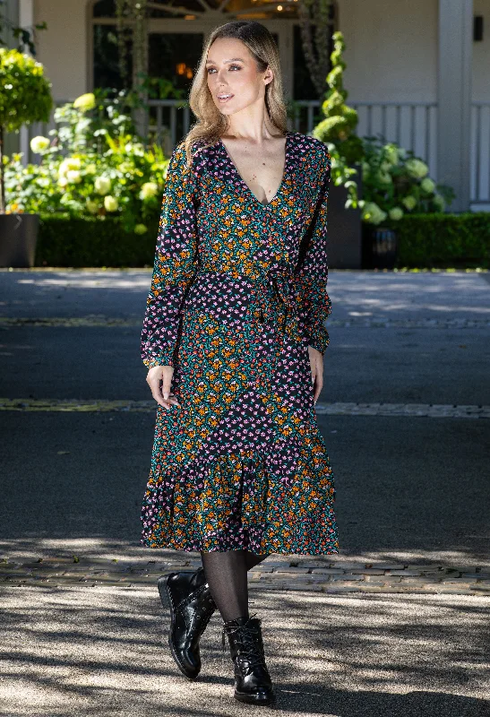 Midi dresses with ribbed textures for a unique and tactile appearance Faux Wrap Style Bloom Dress Midi dresses with ribbed textures for a unique and tactile appearance Faux Wrap Style Bloom Dress