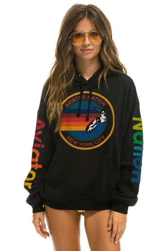 Women's hoodie with a glittery print for a glamorous and sparkly appearanceAVIATOR NATION NEW YORK CITY RELAXED PULLOVER HOODIE - BLACK Women's hoodie with a glittery print for a glamorous and sparkly appearanceAVIATOR NATION NEW YORK CITY RELAXED PULLOVER HOODIE - BLACK