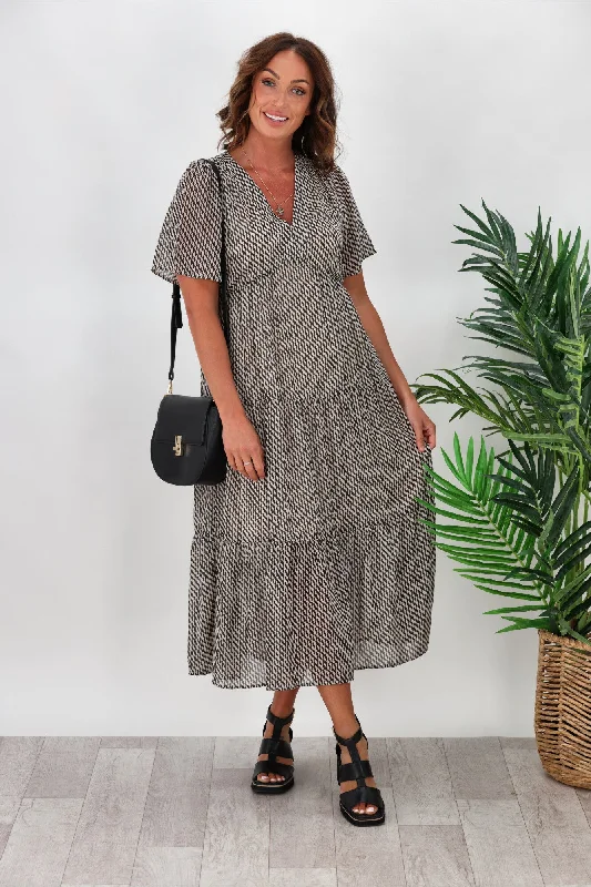 Ruffled Women Dress with Multiple Layers for a Playful and Girly StyleShine On Label Joni Tiered Chiffon Dress Geo Line Print Ruffled Women Dress with Multiple Layers for a Playful and Girly StyleShine On Label Joni Tiered Chiffon Dress Geo Line Print