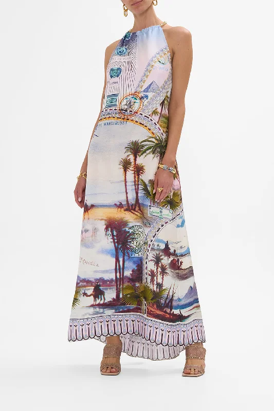 Maxi dresses with fringe trim for a bohemian vibeLOW BACK LONG DRESS WITH NECK HARDWARE CALL ME IN CAIRO Maxi dresses with fringe trim for a bohemian vibeLOW BACK LONG DRESS WITH NECK HARDWARE CALL ME IN CAIRO
