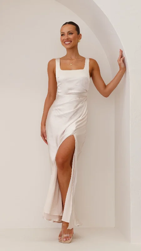 Maxi dresses with a belted empire waist for a more defined and flattering silhouetteAlaria Maxi Dress - Champagne Maxi dresses with a belted empire waist for a more defined and flattering silhouetteAlaria Maxi Dress - Champagne