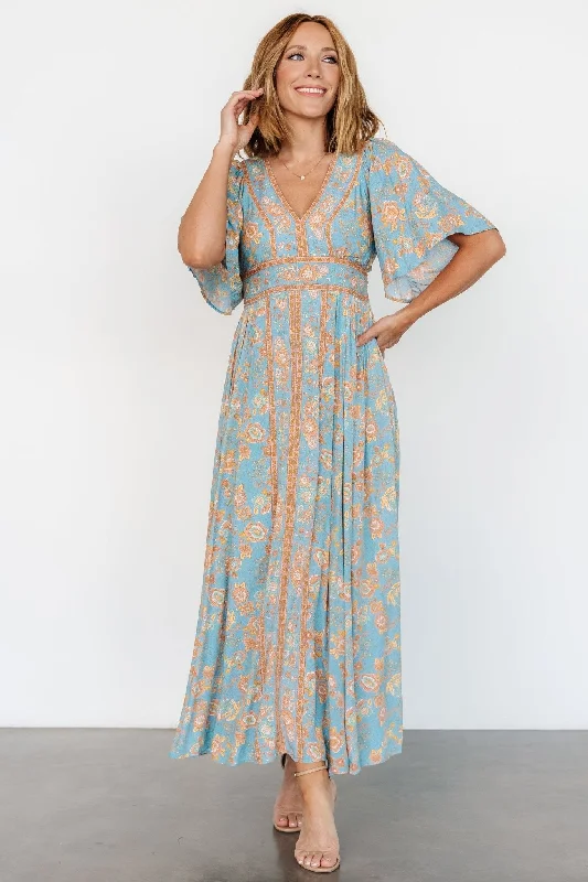 Maxi dresses with a gathered skirt for a voluminous and dramatic effectElissa Maxi Dress | Dusty Blue Floral Maxi dresses with a gathered skirt for a voluminous and dramatic effectElissa Maxi Dress | Dusty Blue Floral