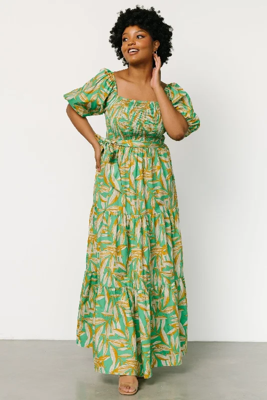 Maxi dresses with cut - out details on the sides for a modern edgeForsythe Smocked Maxi Dress | Green Print Maxi dresses with cut - out details on the sides for a modern edgeForsythe Smocked Maxi Dress | Green Print