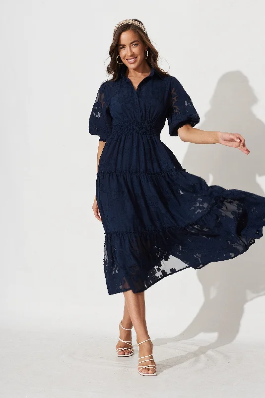 Midi dresses with pom - pom trims for a playful and festive lookBrittney Midi Dress In Navy Chiffon Midi dresses with pom - pom trims for a playful and festive lookBrittney Midi Dress In Navy Chiffon