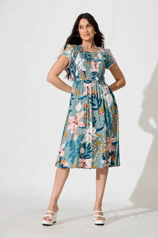 Midi dresses with side slits for a sexy and elegant appearanceClarke Midi Dress in Sage Multi Floral Midi dresses with side slits for a sexy and elegant appearanceClarke Midi Dress in Sage Multi Floral