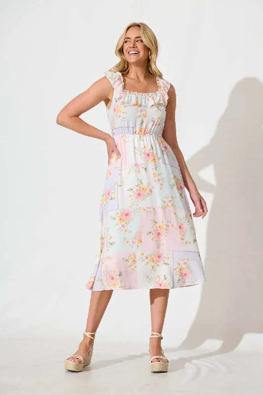Midi dresses with side slits for a sexy and elegant appearancePaige Midi Dress In Pastel Floral Patchwork Linen Blend