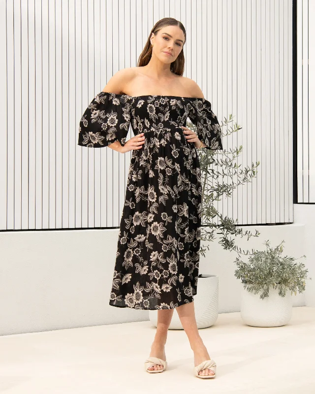 Midi dresses with halter necks for a stylish and comfortable optionTrina Shirred Dress Black / Natural Midi dresses with halter necks for a stylish and comfortable optionTrina Shirred Dress Black / Natural