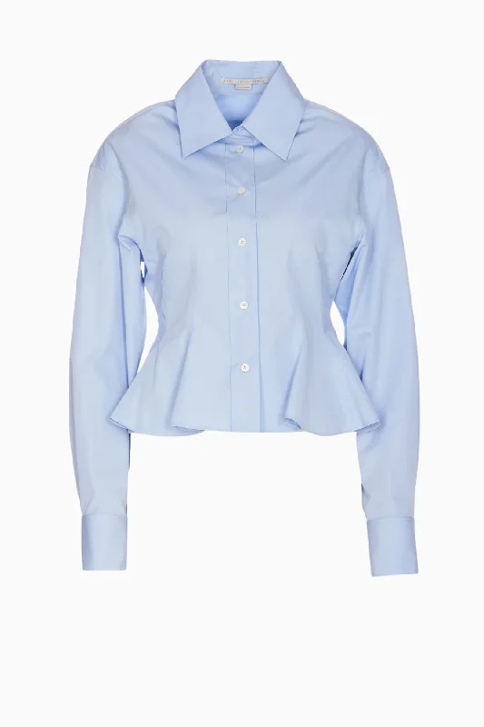 Distressed women jeans for a trendy and edgy lookStella McCartney Peplum Shirt - Sky Blue Distressed women jeans for a trendy and edgy lookStella McCartney Peplum Shirt - Sky Blue