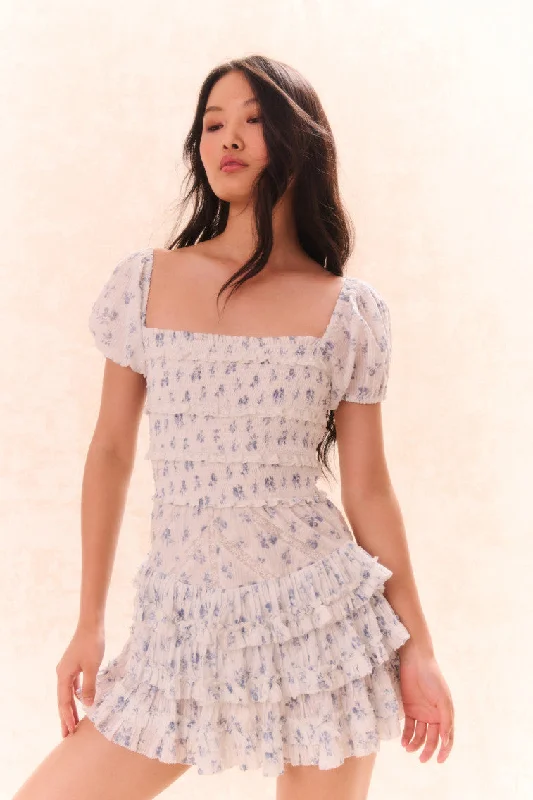Mini dresses with pom - pom trims for a playful feelFellows Cotton Floral Dress