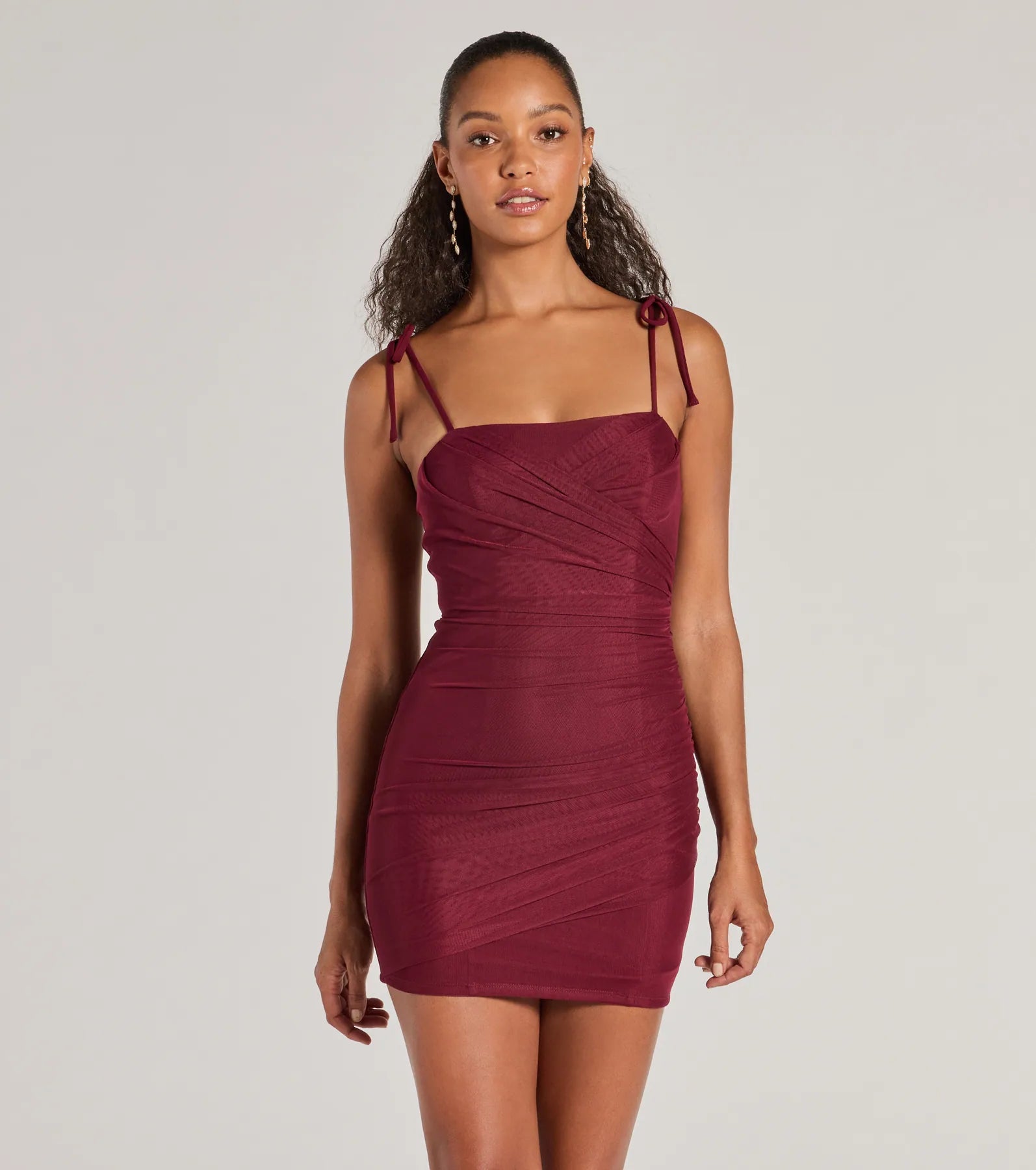 Mini dresses with tiered skirts for added volumeGlamorous Nights Mesh And Crepe Ruched Mini Dress