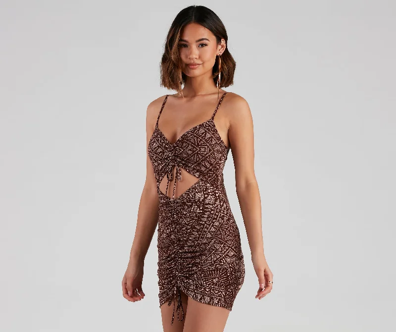 Bodycon dress made of stretchy spandex for comfort​Geometric Fun Cutout Mini Dress