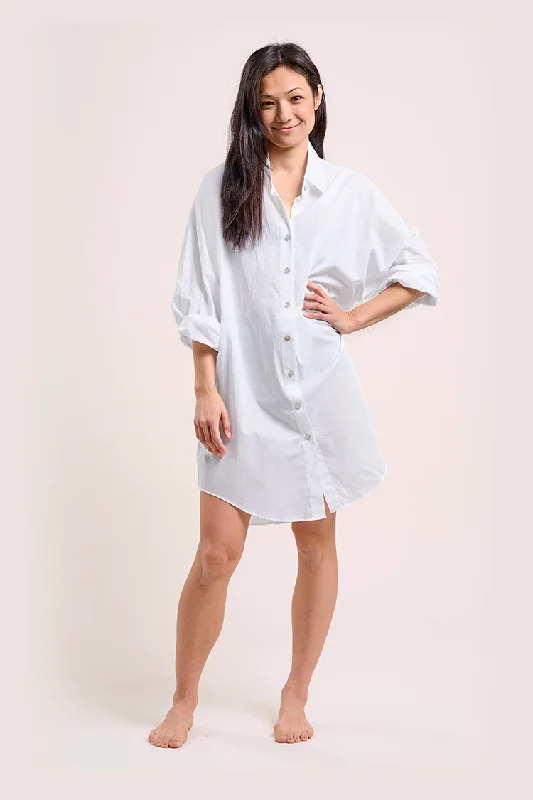 Minimalist - designed cover ups for a sleek and simple beach appearanceTHE PERFECT BUTTON DOWN COVER UP Minimalist - designed cover ups for a sleek and simple beach appearanceTHE PERFECT BUTTON DOWN COVER UP